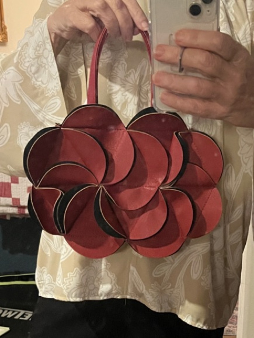 Verano Hill Red Vegan ‘leather’ petal handbag with crossbody strap